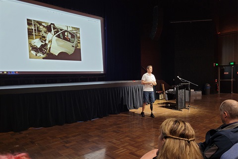 Paralympian Brett Stibners speaking to staff for Road Safety Week