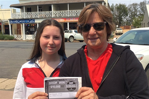 Claire Way and daughter Jessica with winning ticket - for web.jpg