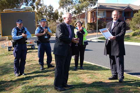 Minister Coulton presents the National Road Safety Award to Mayor Overall