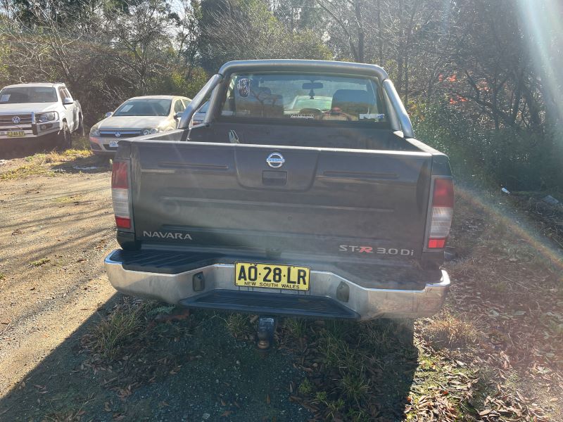 Black Nissan twin cab rear