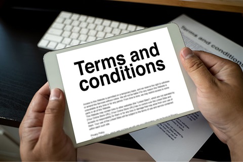 Tablet showing Terms and Conditions on screen