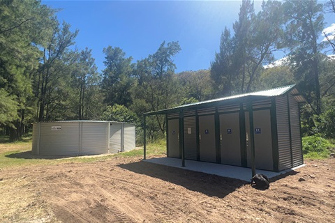 Toilet facilities and water tank at Araluen campground