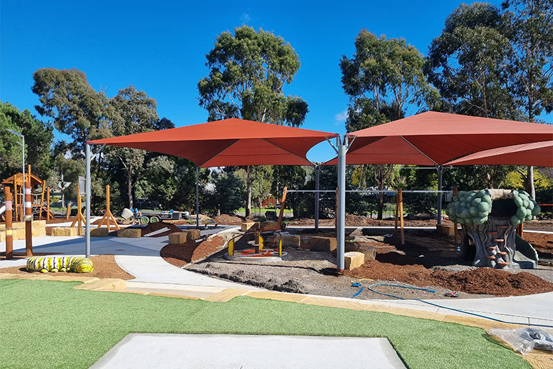 Progress works on Bungendore playground showing installation of play equipment and softfall