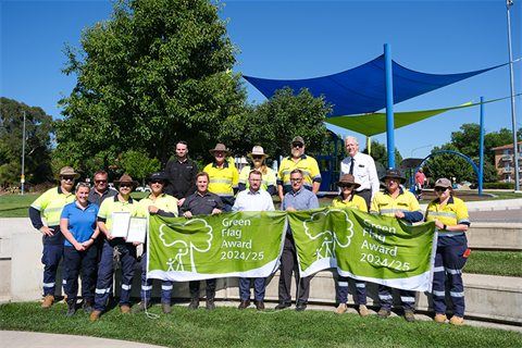 Queanbeyan Parks team accept Green Flag  Award at QE II Park on 16 December 2024