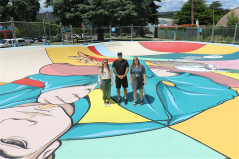 Image of artists Mike, Arina, and council staff Cristina