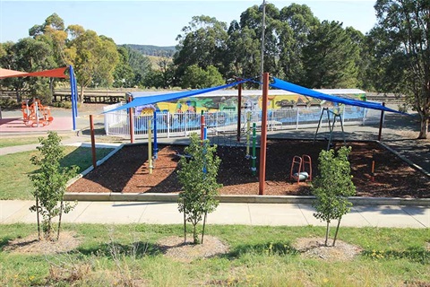 View of Railway Park including play equipment, outdoor gym and railway carriage which is available for hire