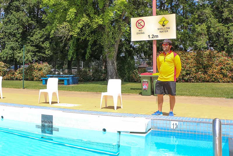 QPRC lifeguard on patrol at Queanbeyan outdoor pool